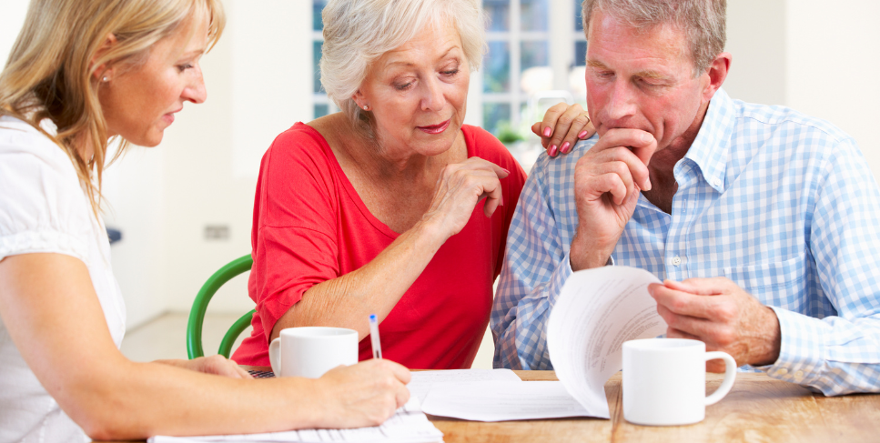 Insurance Planning Couple looking over paperwork